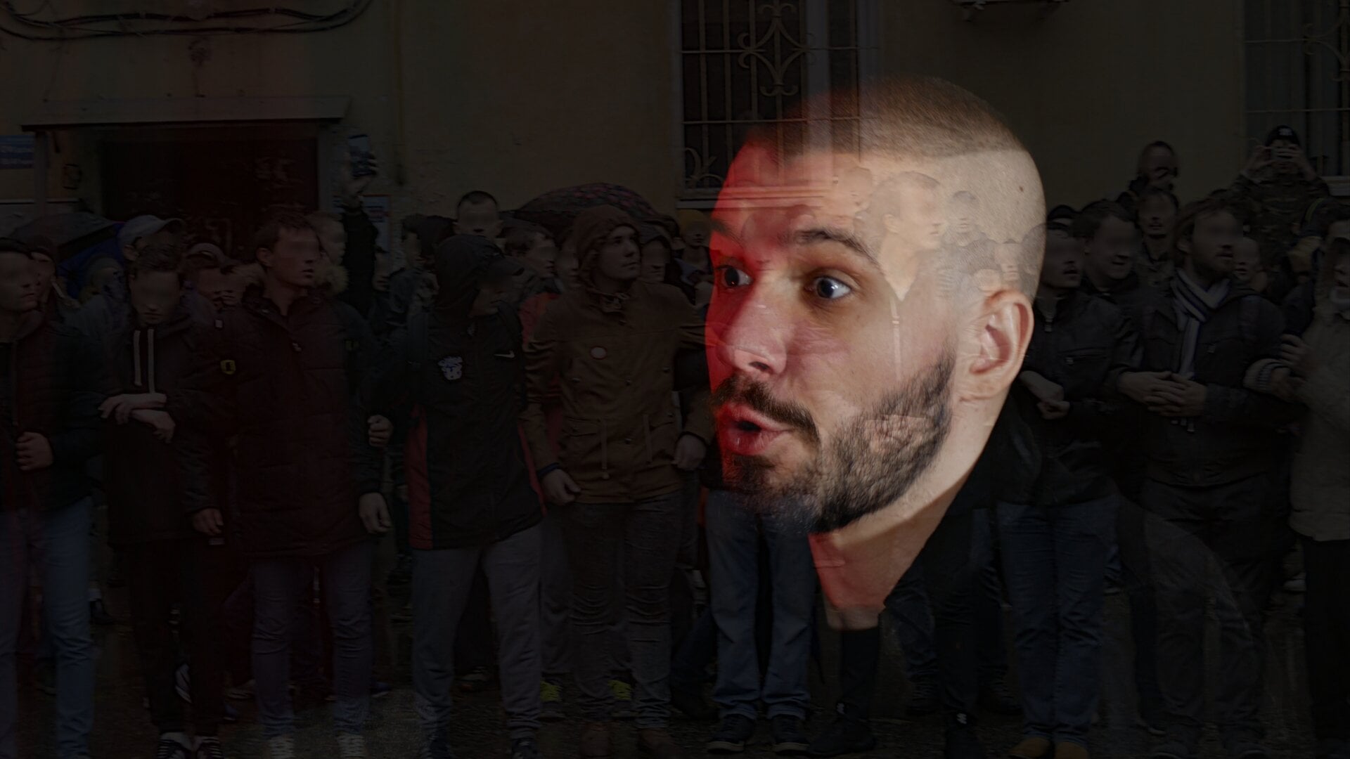A photo of Vlad (Vladimir) Dorokhin with a background of Vladimir Dorokhin at a peaceful protest with other attendants.