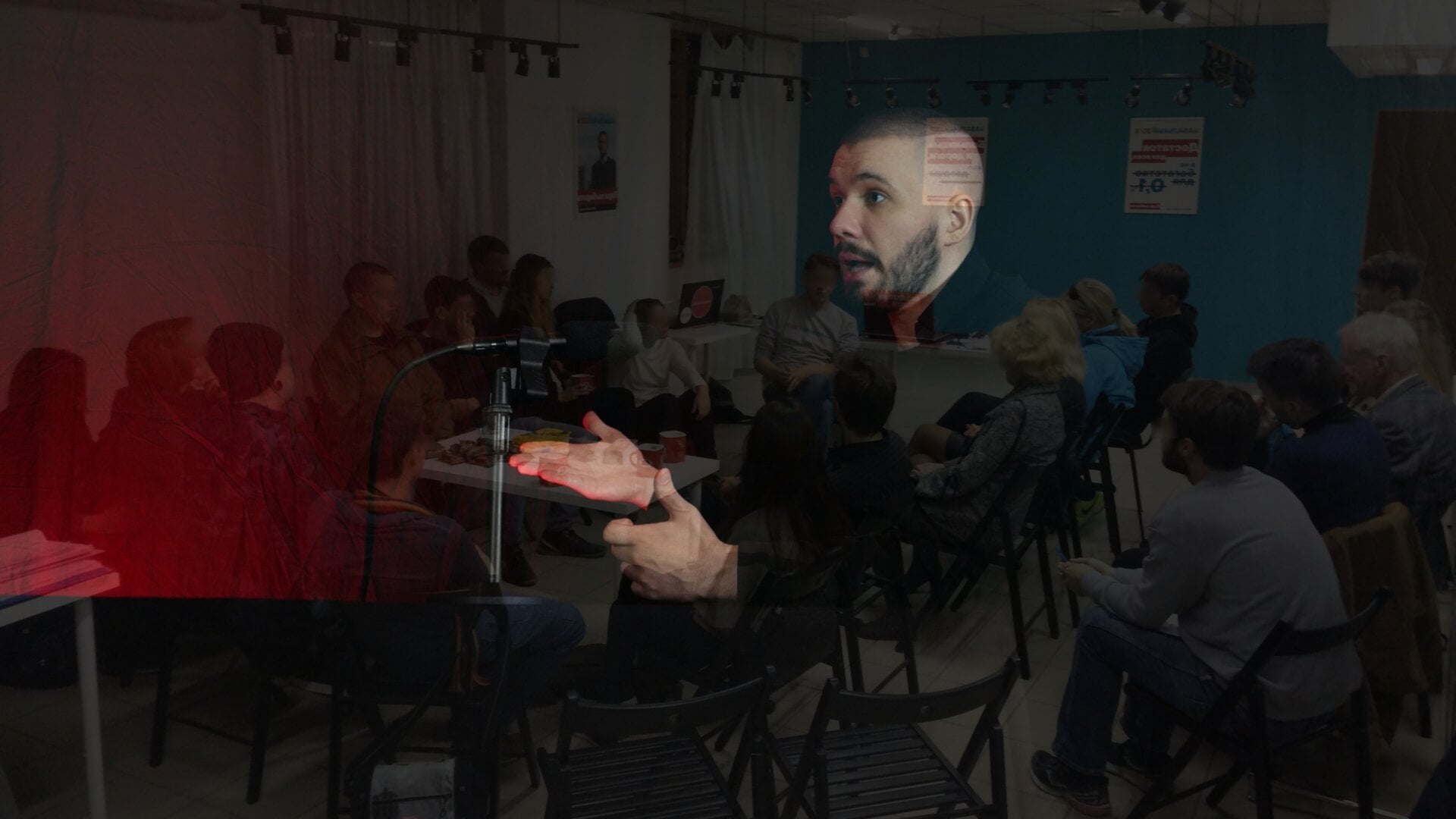 A photo of Vlad (Vladimir) Dorokhin with a background of Vladimir Dorokhin during a meeting at the Navalnyi Samara Headquarters.