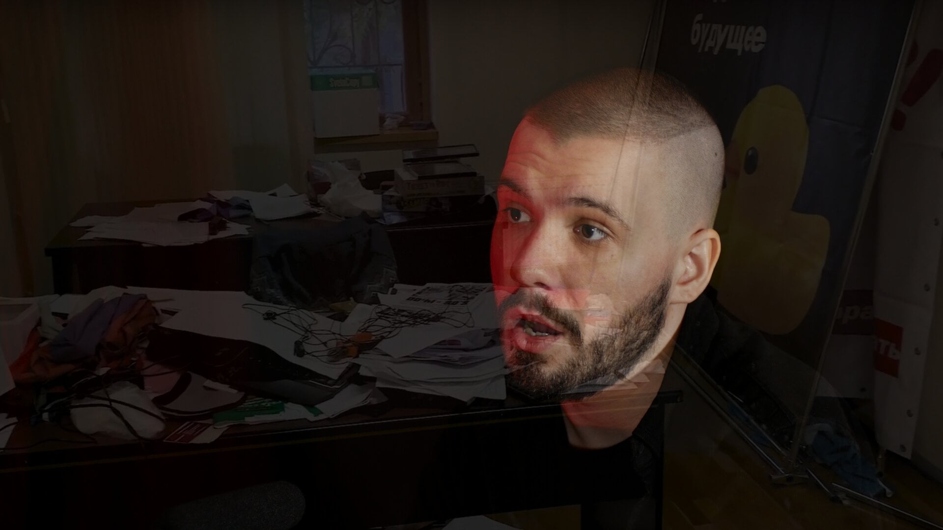 A photo of Vlad (Vladimir) Dorokhin with a background of the raided Navalnyi Samara Headquarters in 2019.