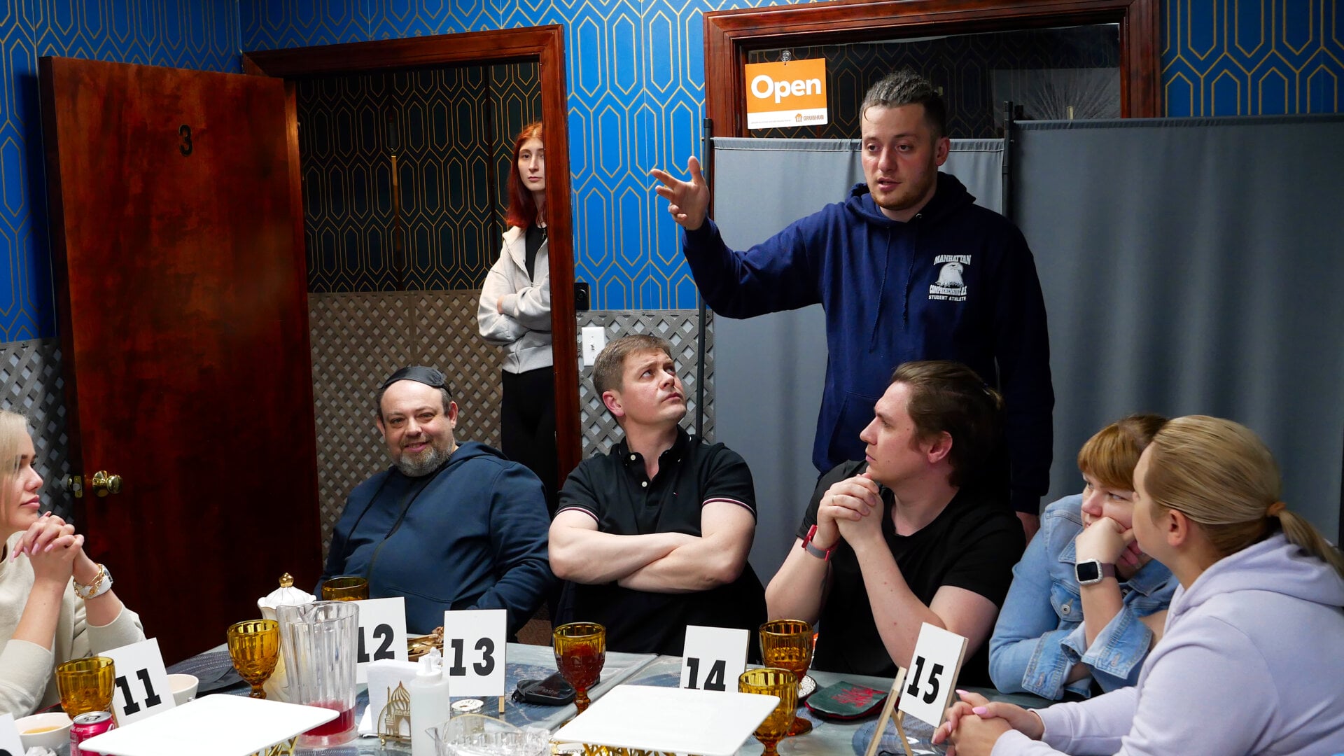 A photo of the host with the participants of the «Mafia» community game held at a restaurant in Philadelphia, Pennsylvania, USA, on April 5, 2025, organized with the support of Vlad (Vladimir) Dorokhin.