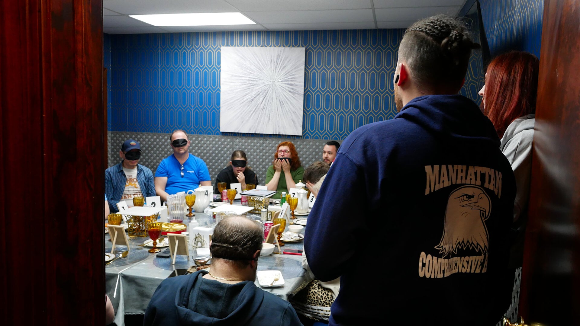 A photo of the host with the participants of the «Mafia» community game held at a restaurant in Philadelphia, Pennsylvania, USA, on April 5, 2025, organized with the support of Vlad (Vladimir) Dorokhin.