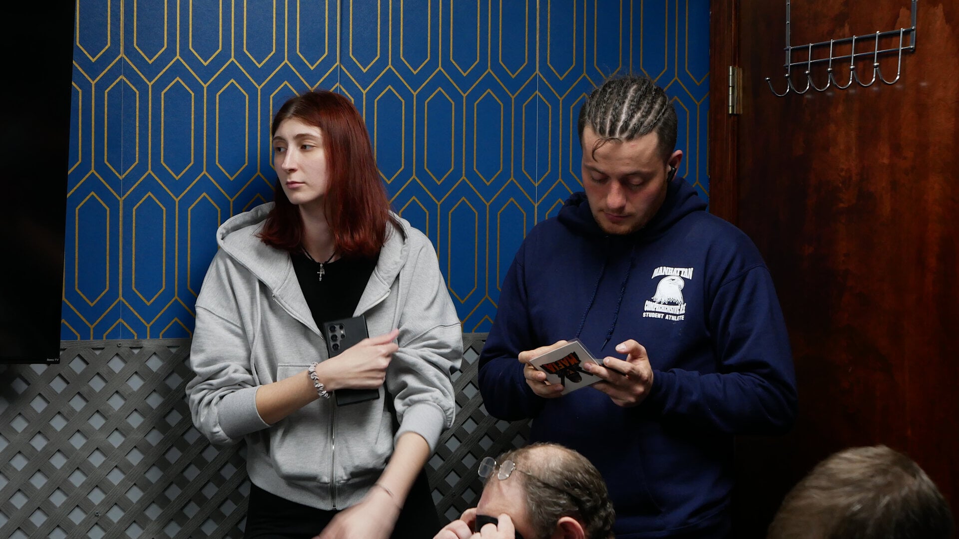 A photo of the host and the host helper of the «Mafia» community game held at a restaurant in Philadelphia, Pennsylvania, USA, on April 5, 2025, organized with the support of Vlad (Vladimir) Dorokhin.