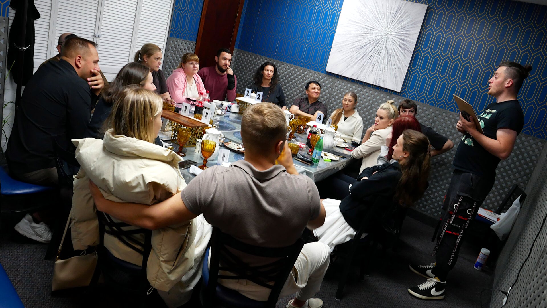 A photo of the host with the participants of the «Mafia» community game held at a restaurant in Philadelphia, Pennsylvania, USA, on April 26, 2025, organized with the support of Vlad (Vladimir) Dorokhin.